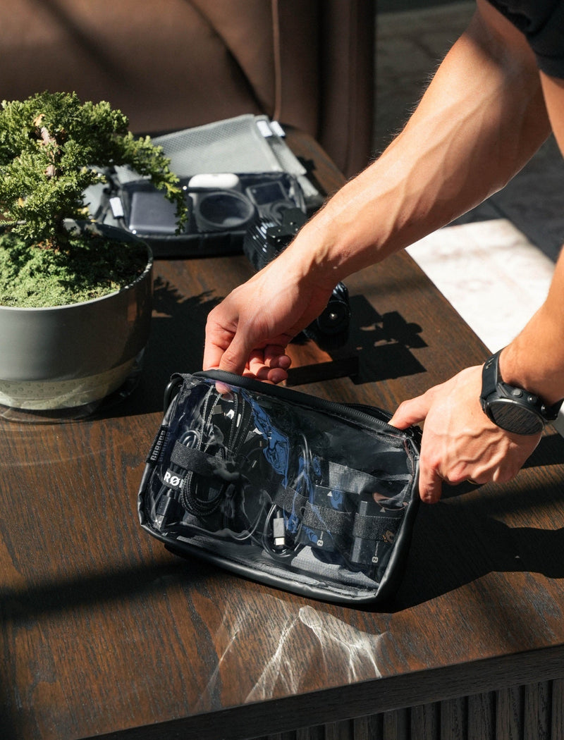 GOBAGS Neo Travel Pouch, small, in black — clear-front organizer for full-length cable runs